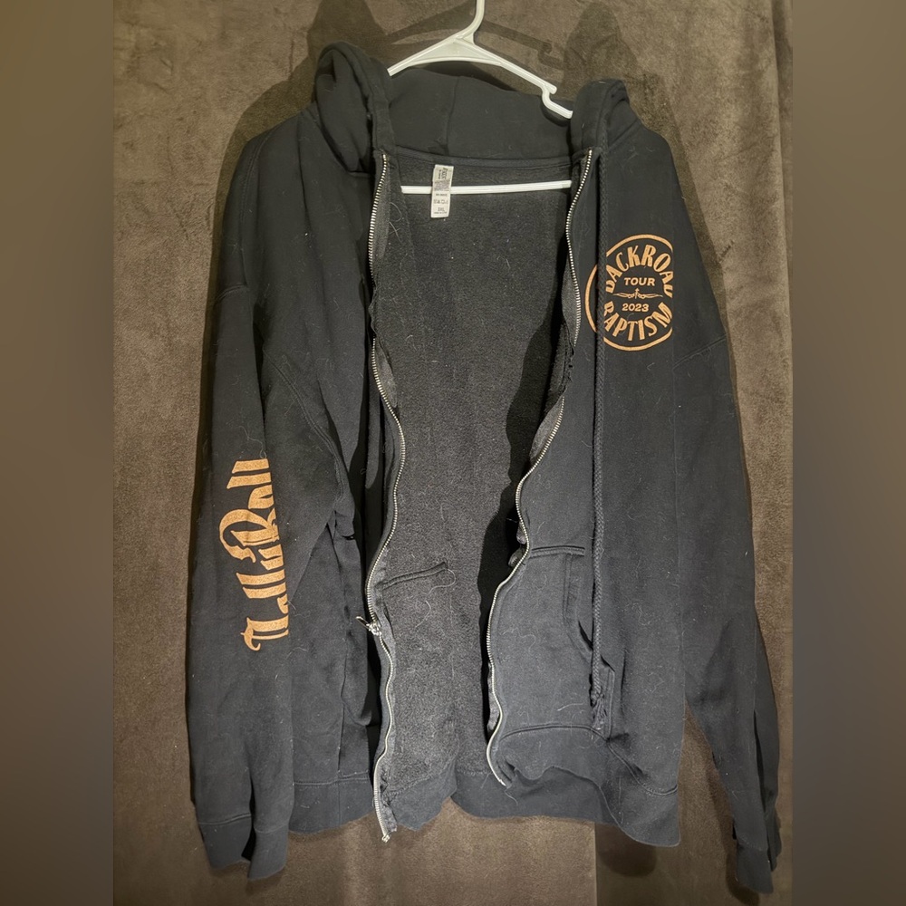 Black Zip-Up Hoodie with Orange Tour Graphics